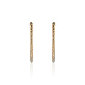 The Erin Hoop earring designed by Natalie McMillan is an absolute staple. Just the right size and none of the heaviness, this hoop is perfect for every day wear.