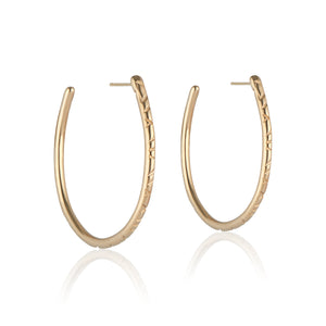 The Erin Hoop earring designed by Natalie McMillan is an absolute staple. Just the right size and none of the heaviness, this hoop is perfect for every day wear.