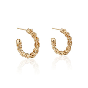 These solid 14K Yellow Zeppelin Gold Hoops feature 14k Gold posts and earnuts and are safe for sensitive ears. Their twisted design gives them the appearance of being heavy, while actually being lightweight. In true Natalie McMillan fashion, there are tiny etching details throughout. 