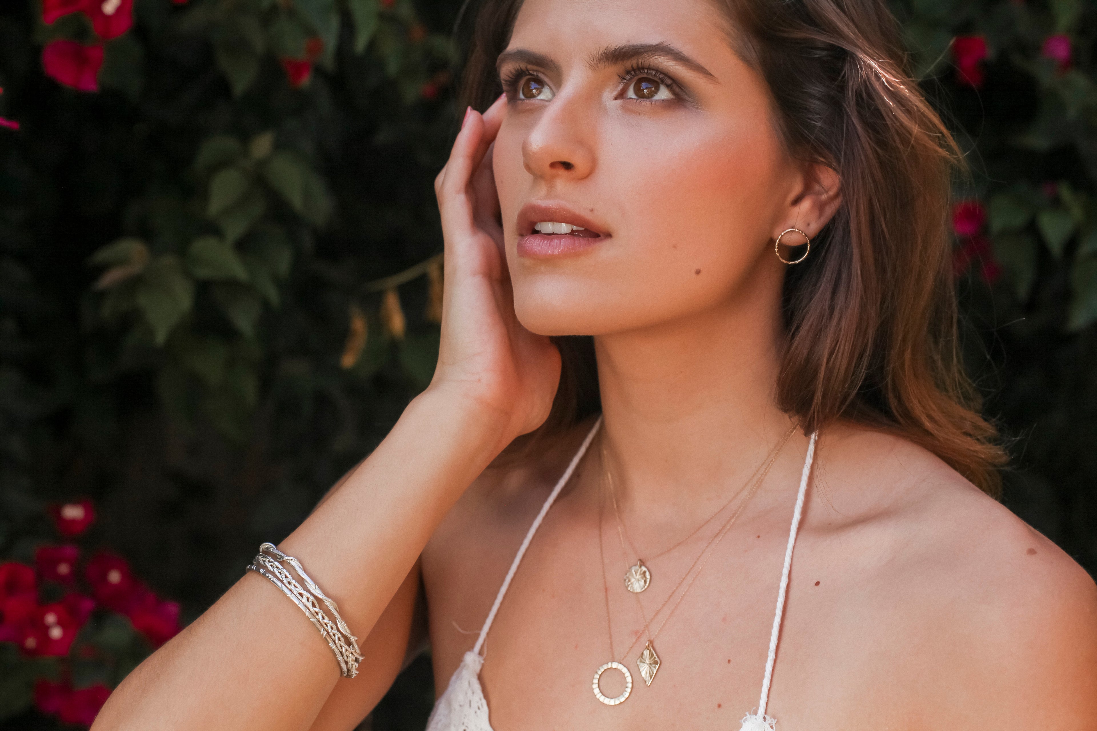 Dainty, sweet, and delicate. The Natalie McMillan Stella Necklace is the perfect necklace to wear every day and keep close to your heart. Its 14k gold pendant hangs on a delicate gold chain.